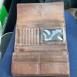 VTG FRYE TRIFOLD I believe is Melissa style but it’s at least 20+ yes offers ok